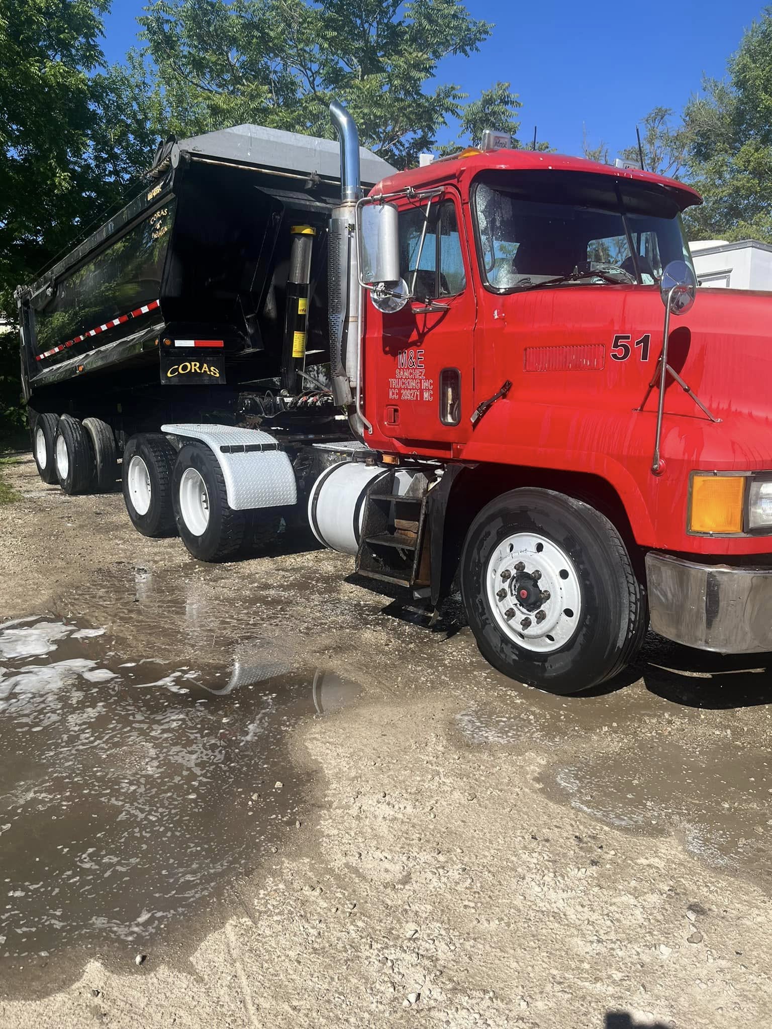 Mack truck 51 with Coras dump trailer wash
